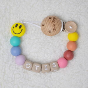 Setje van speenkoord en bijtring smiley thema gepersonaliseerd met naam